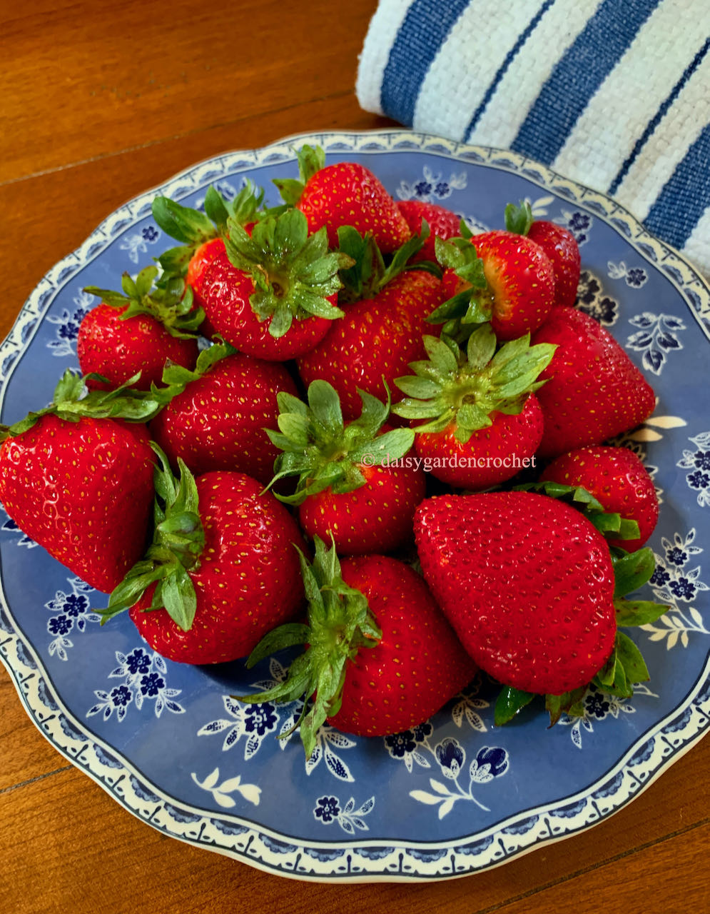 Ripe strawberries on a plate