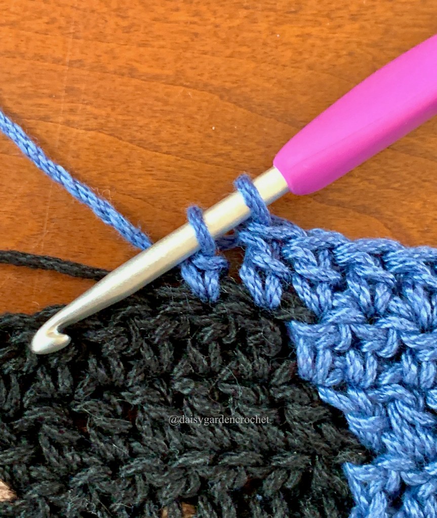 Step 1 in making a blended double crochet color change