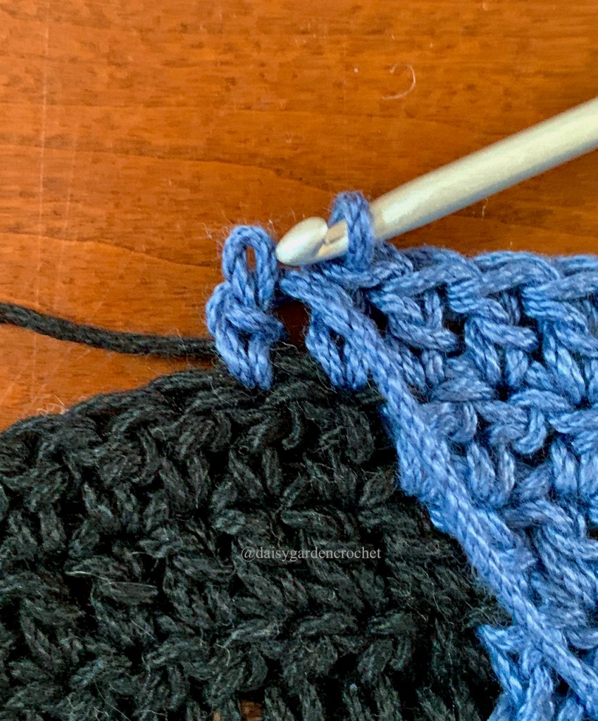 Step 2 in making a blended double crochet color change