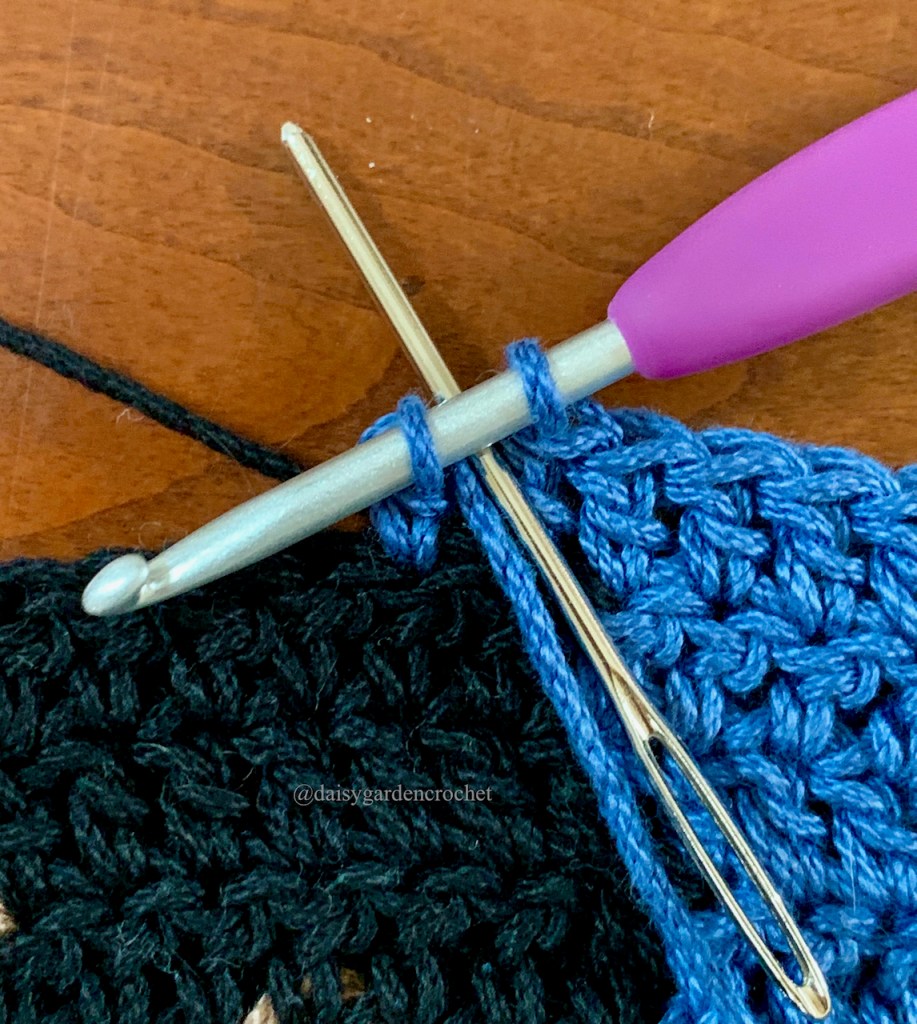 Step 3 in making a blended double crochet color change